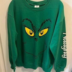 New, with tags. Christmas Grinch sweatshirt. Naughty written on sleeve.  Lg